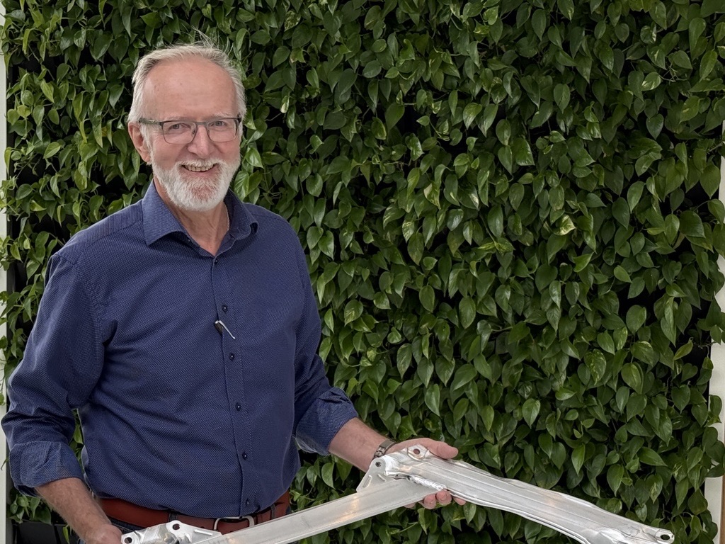 a man holding a piece of paper