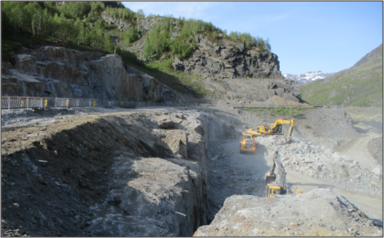 a construction vehicle on a rocky hillside