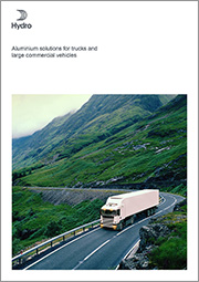 a truck driving down a road