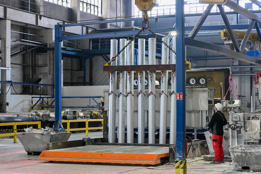 a person standing in a factory