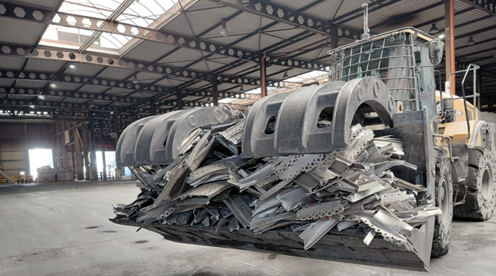 a large metal bucket in a warehouse